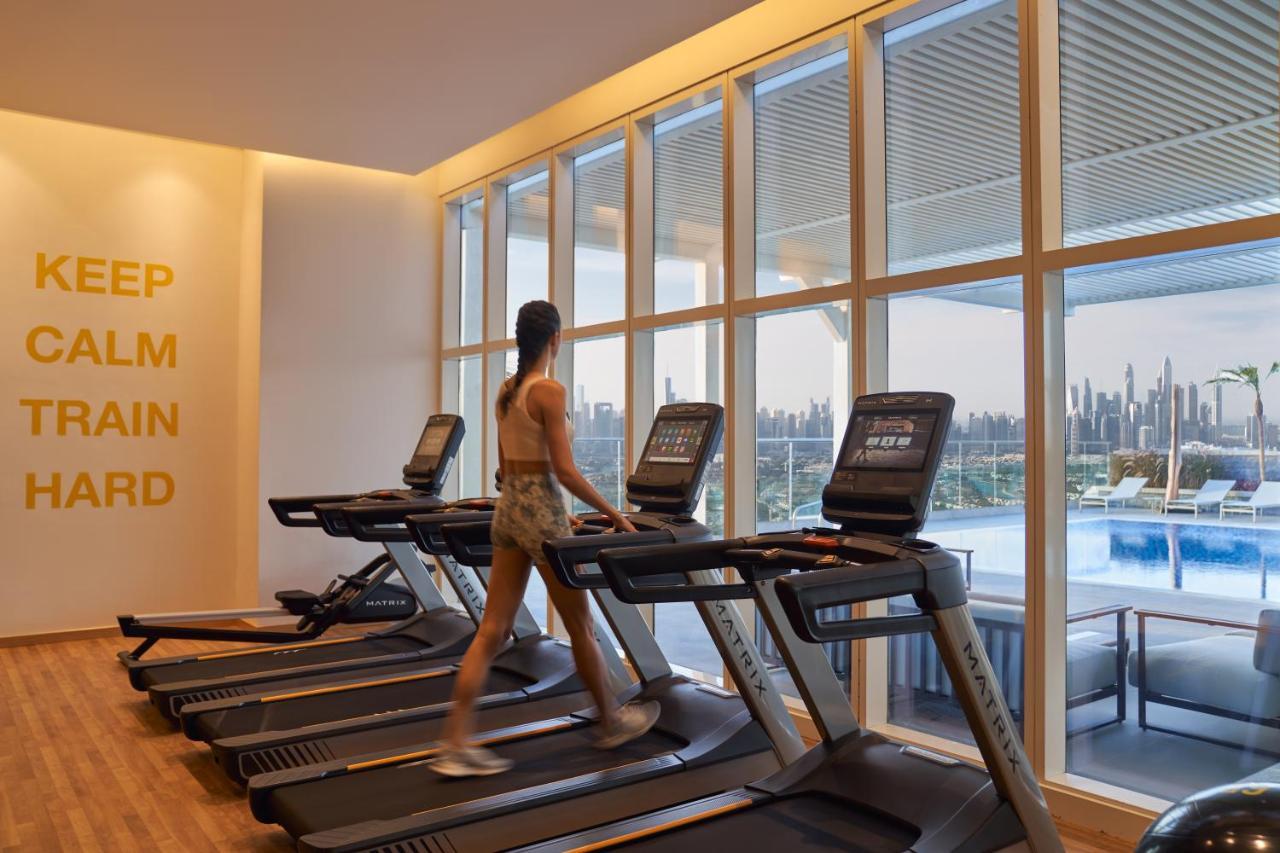 Movenpick Jumeirah Village Triangle Дубай Экстерьер фото The gym at the hotel
