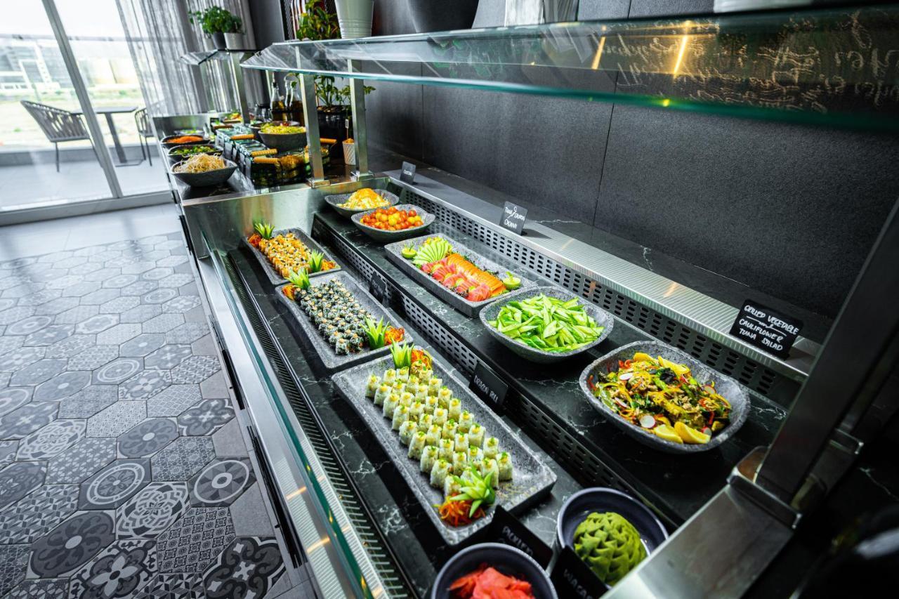 Movenpick Jumeirah Village Triangle Дубай Экстерьер фото A salad bar