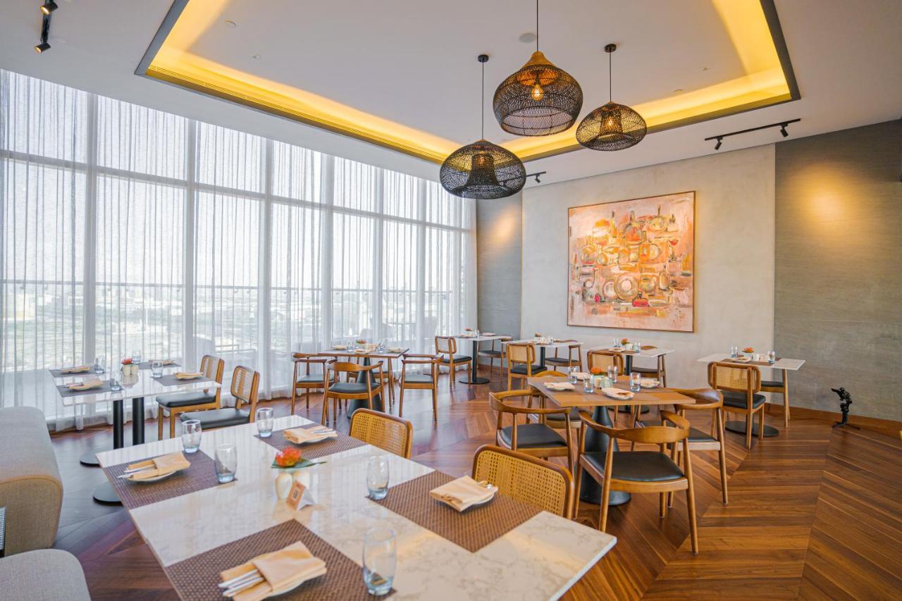 Movenpick Jumeirah Village Triangle Дубай Экстерьер фото The restaurant