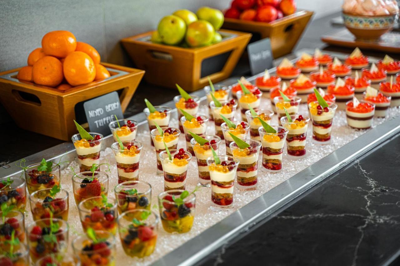 Movenpick Jumeirah Village Triangle Дубай Экстерьер фото A dessert buffet