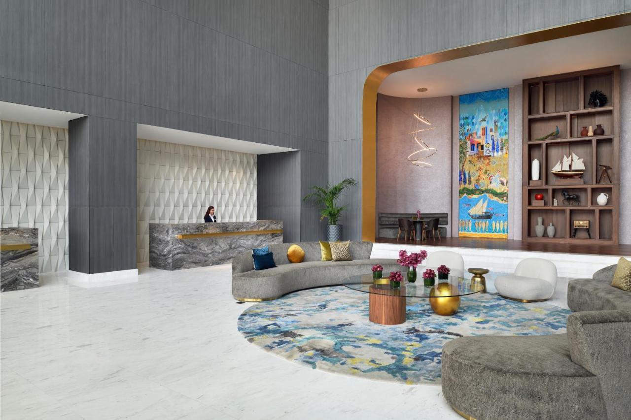 Movenpick Jumeirah Village Triangle Дубай Экстерьер фото The lobby of the hotel