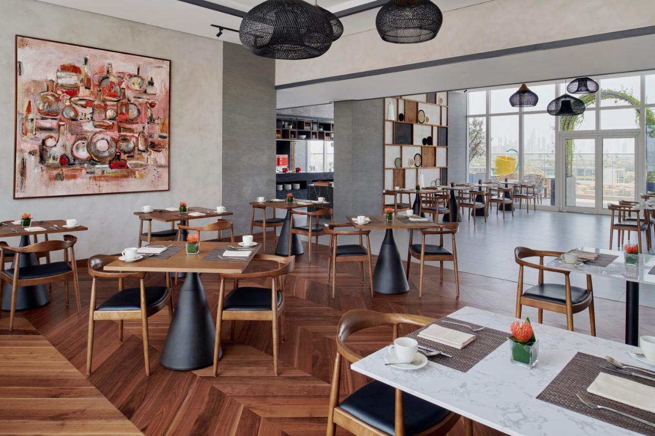 Movenpick Jumeirah Village Triangle Дубай Экстерьер фото The restaurant